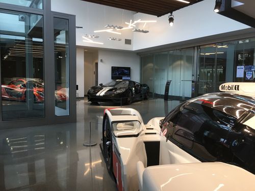 Showroom with Porsche 919 Hybrid Evo and Ford GT